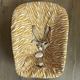 Stokke Newborn hoes Zebra geel
