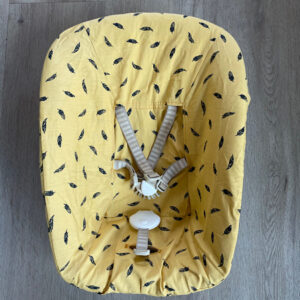 Stokke Newborn hoes Veertjes geel zwart